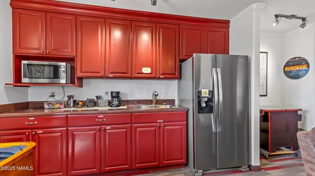 a view of a hallway with washer and dryer