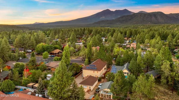 a view of a city with mountain