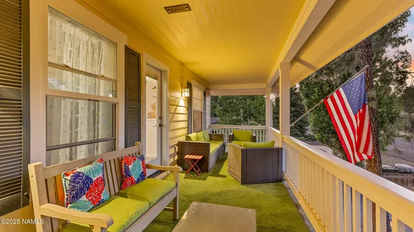 a bathroom with a sink mirror and toilet