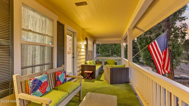 a bathroom with a sink mirror and toilet