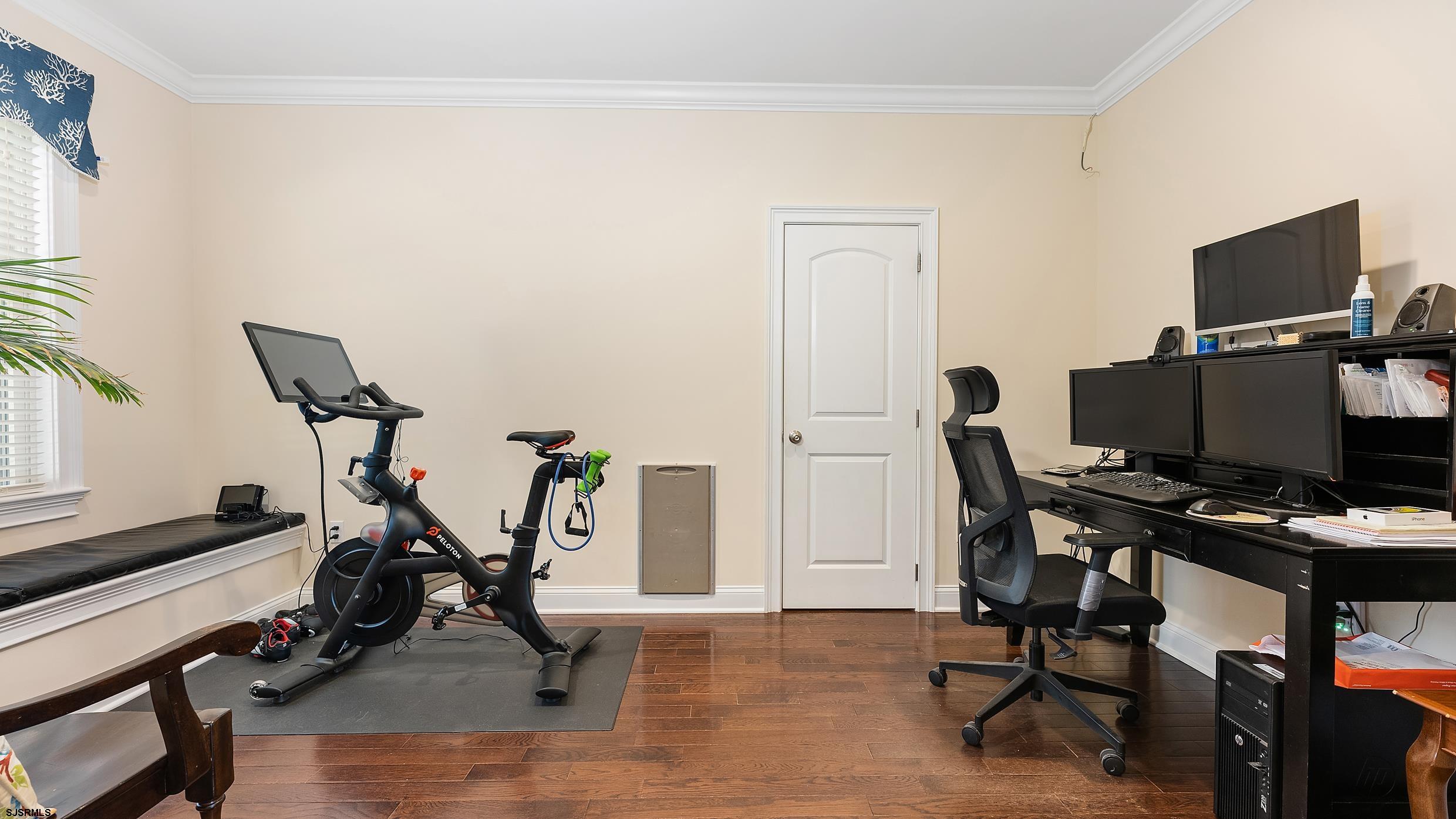 25 Brookside Drive Egg Harbor Township, NJ 08234 - Photo 12 of 47 a view of a workspace with furniture and a window