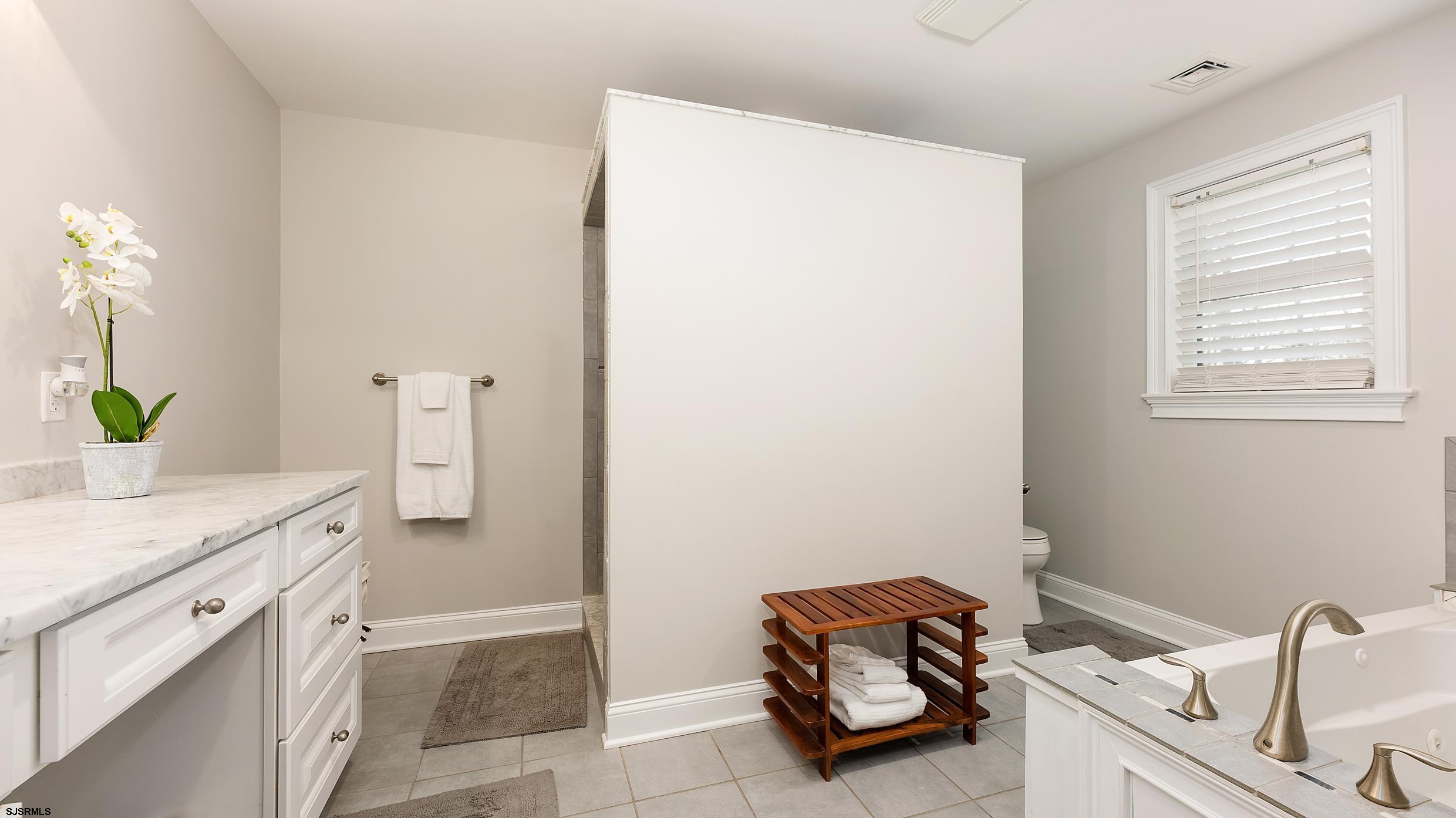 25 Brookside Drive Egg Harbor Township, NJ 08234 - Photo 15 of 47 a room with a sink and a cabinets