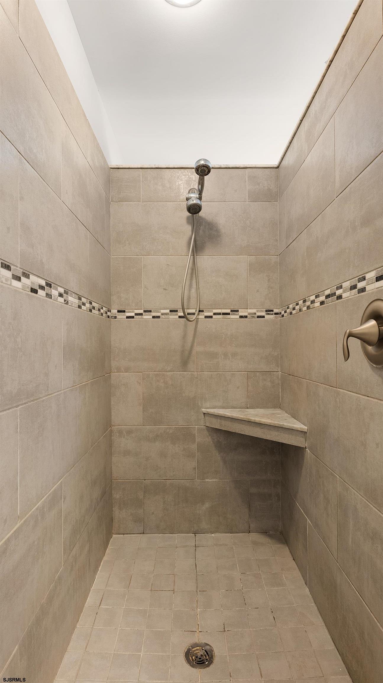 25 Brookside Drive Egg Harbor Township, NJ 08234 - Photo 17 of 47 a bathroom with a shower