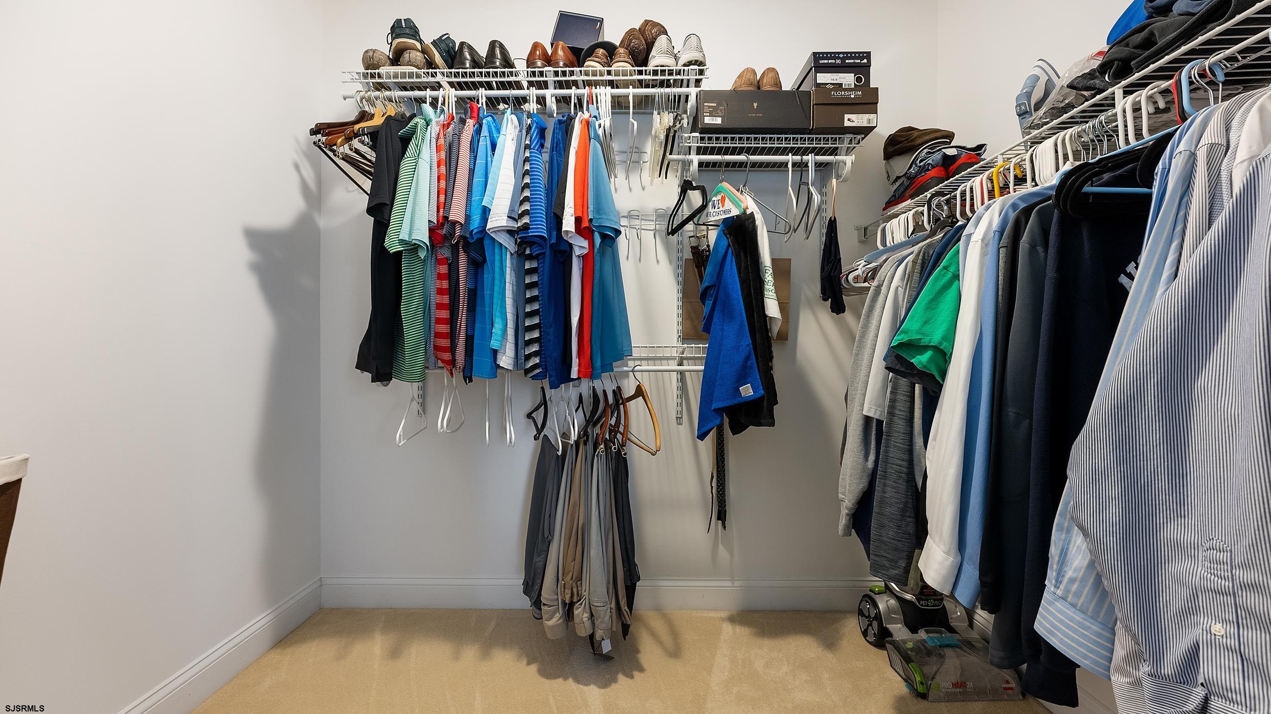 25 Brookside Drive Egg Harbor Township, NJ 08234 - Photo 21 of 47 a view of walk in closet with clothes