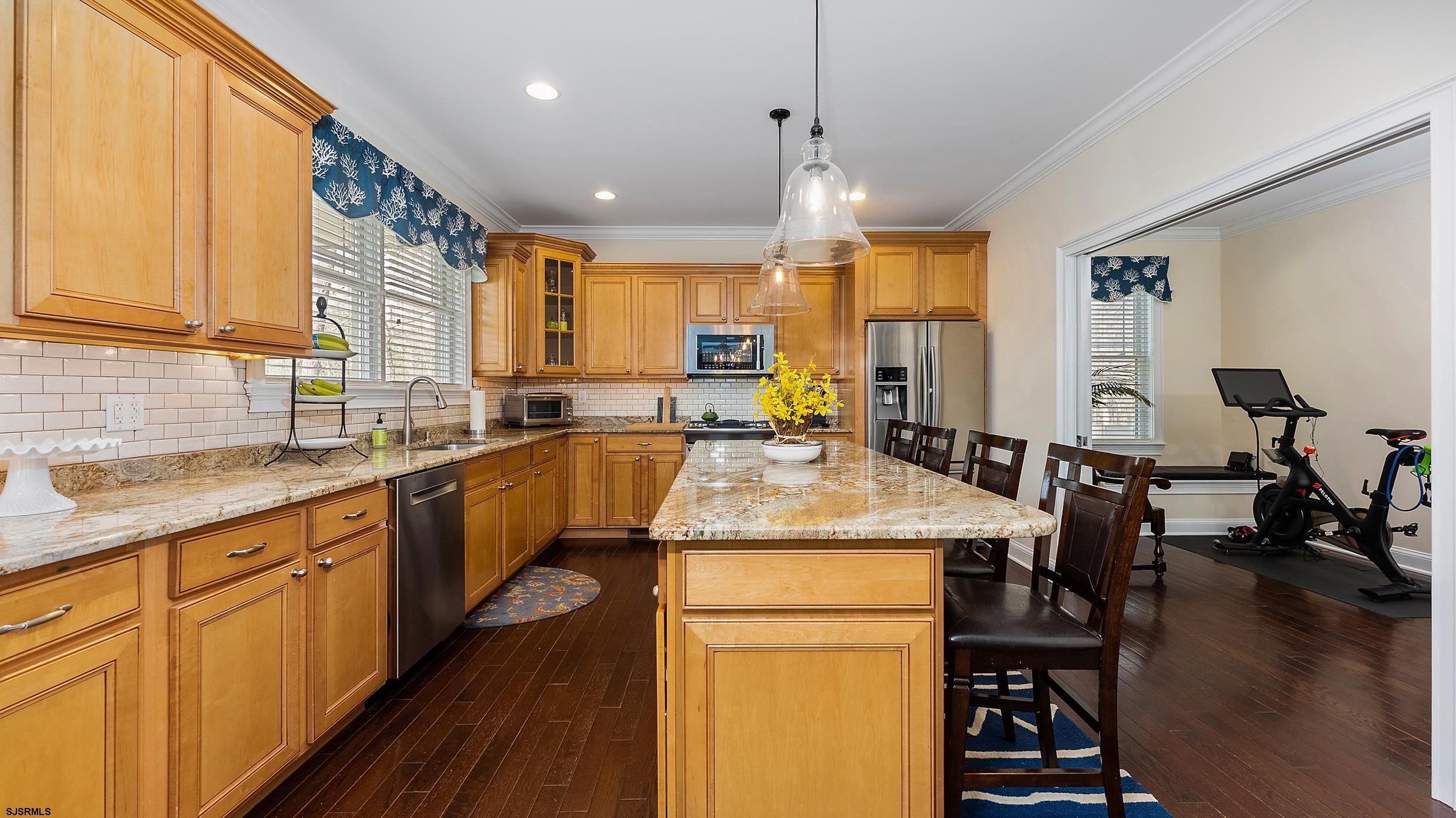 25 Brookside Drive Egg Harbor Township, NJ 08234 - Photo 4 of 47 a kitchen with center island appliances and furniture