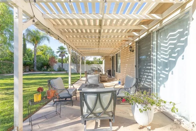 a outdoor living space with furniture and garden view
