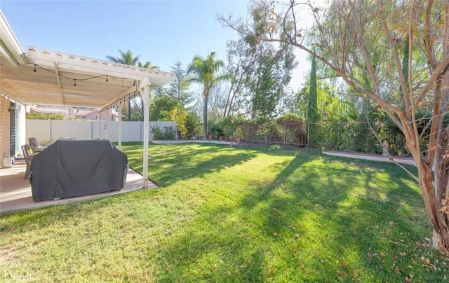 a view of a backyard with a small cabin