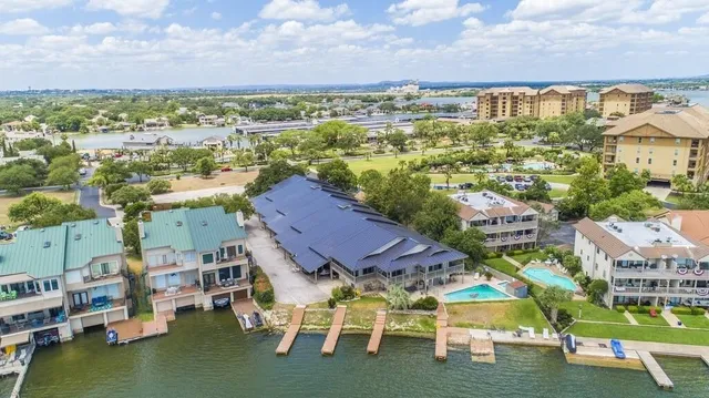 a view of a city with lawn chairs