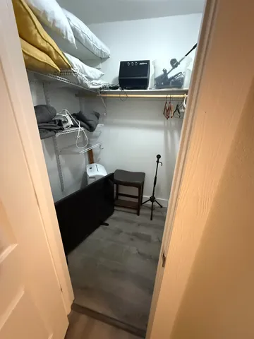 a view of a workspace with furniture