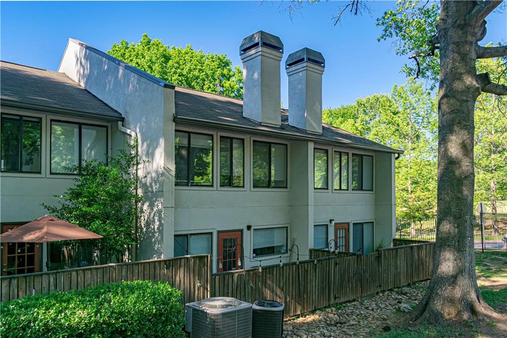 19 Finch Trail Northeast Atlanta, GA 30308 - Photo 22 of 28 a front view of a house with balcony