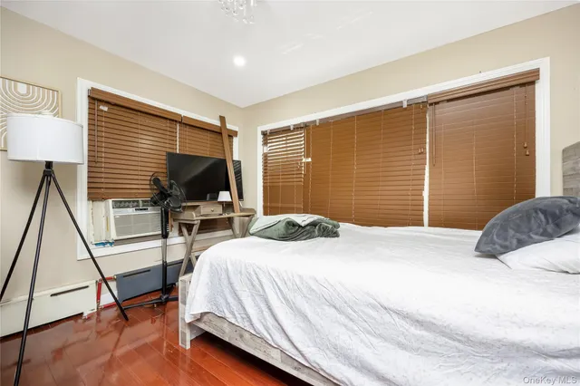 a white toilet sitting next to a white sink