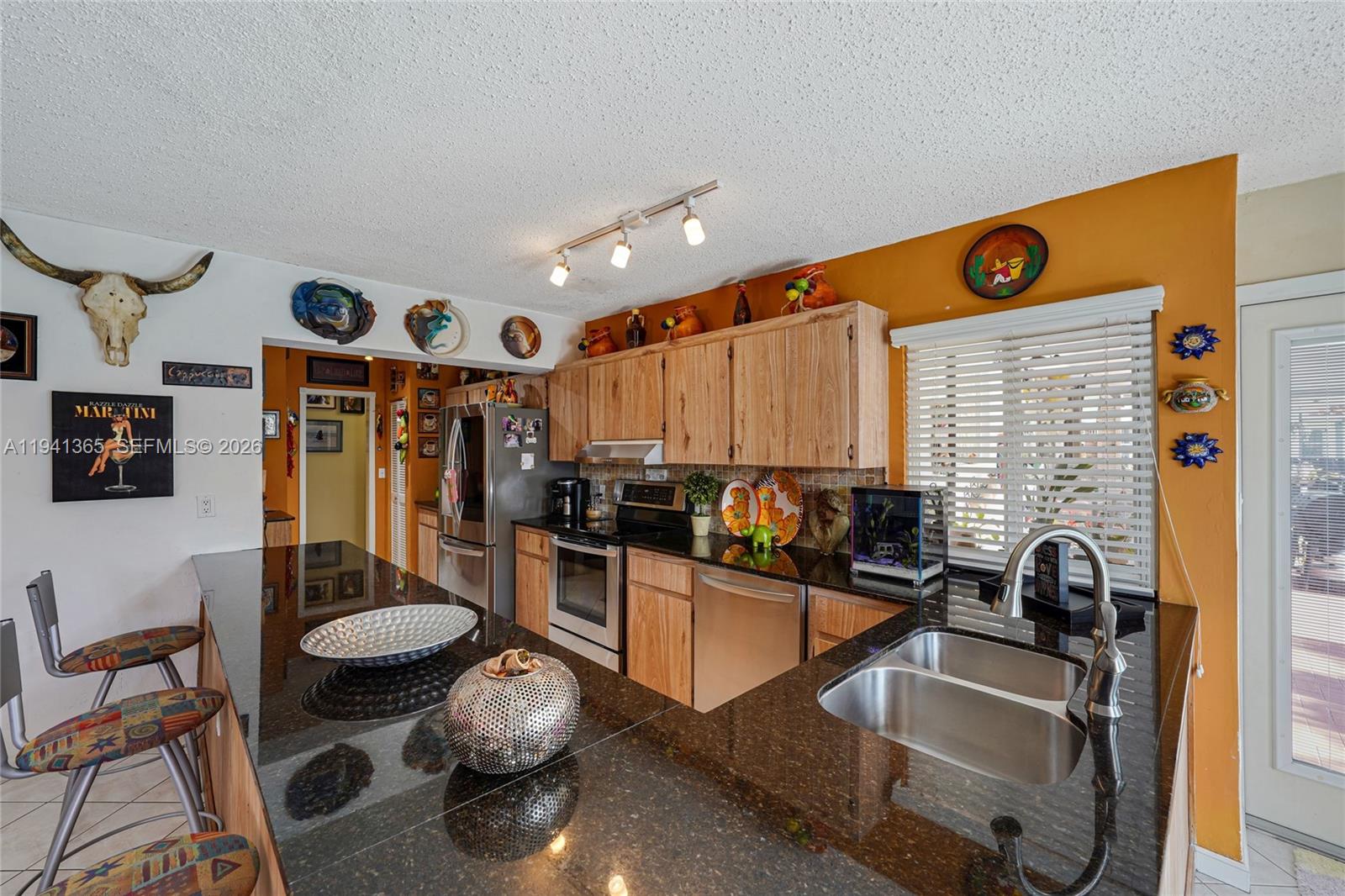 7256 Southwest 16th Street Miami, FL 33155 - Photo 11 of 25 a view of a room with gym equipment