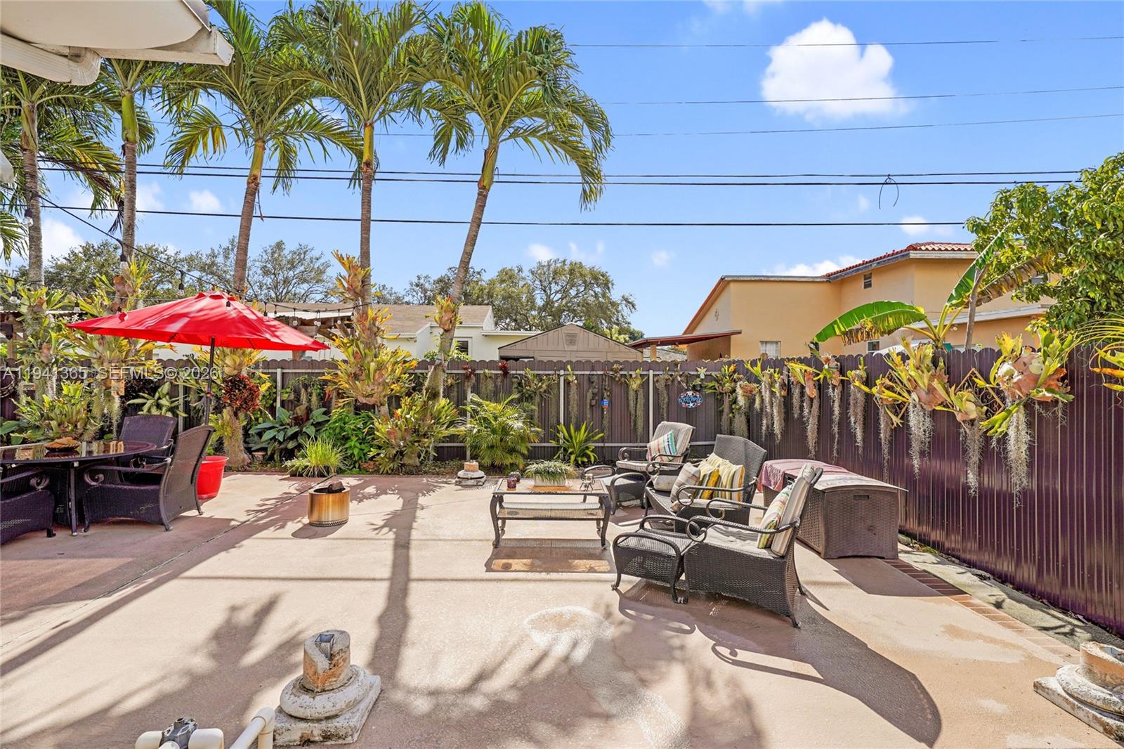 7256 Southwest 16th Street Miami, FL 33155 - Photo 22 of 25 a view of a patio with swimming pool