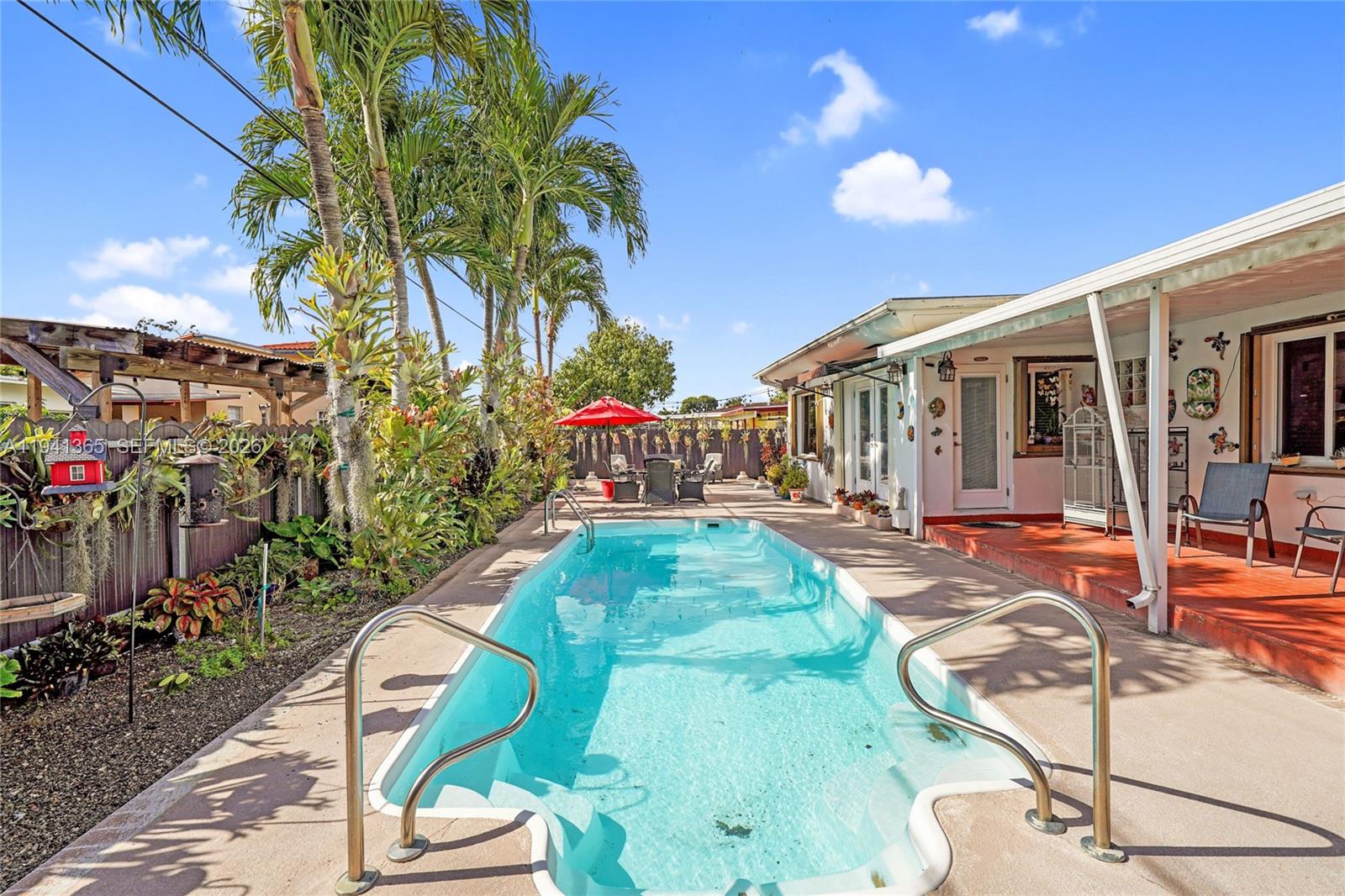 7256 Southwest 16th Street Miami, FL 33155 - Photo 23 of 25 a view of a house with backyard