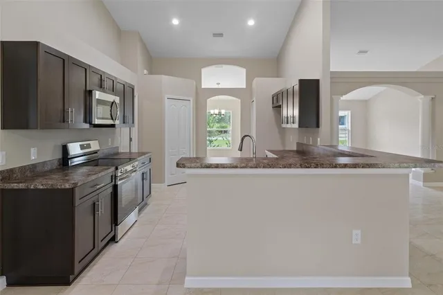a view of living room cabinets and microwave
