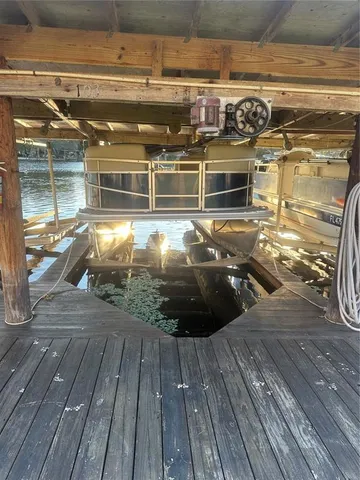 a view of a balcony with car parked