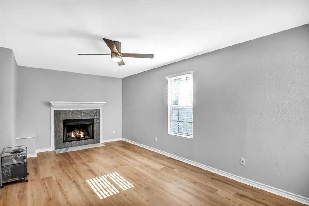 1915 Shaw Street Dallas, TX 75212 - Photo 4 of 34 a living room with furniture and a fireplace