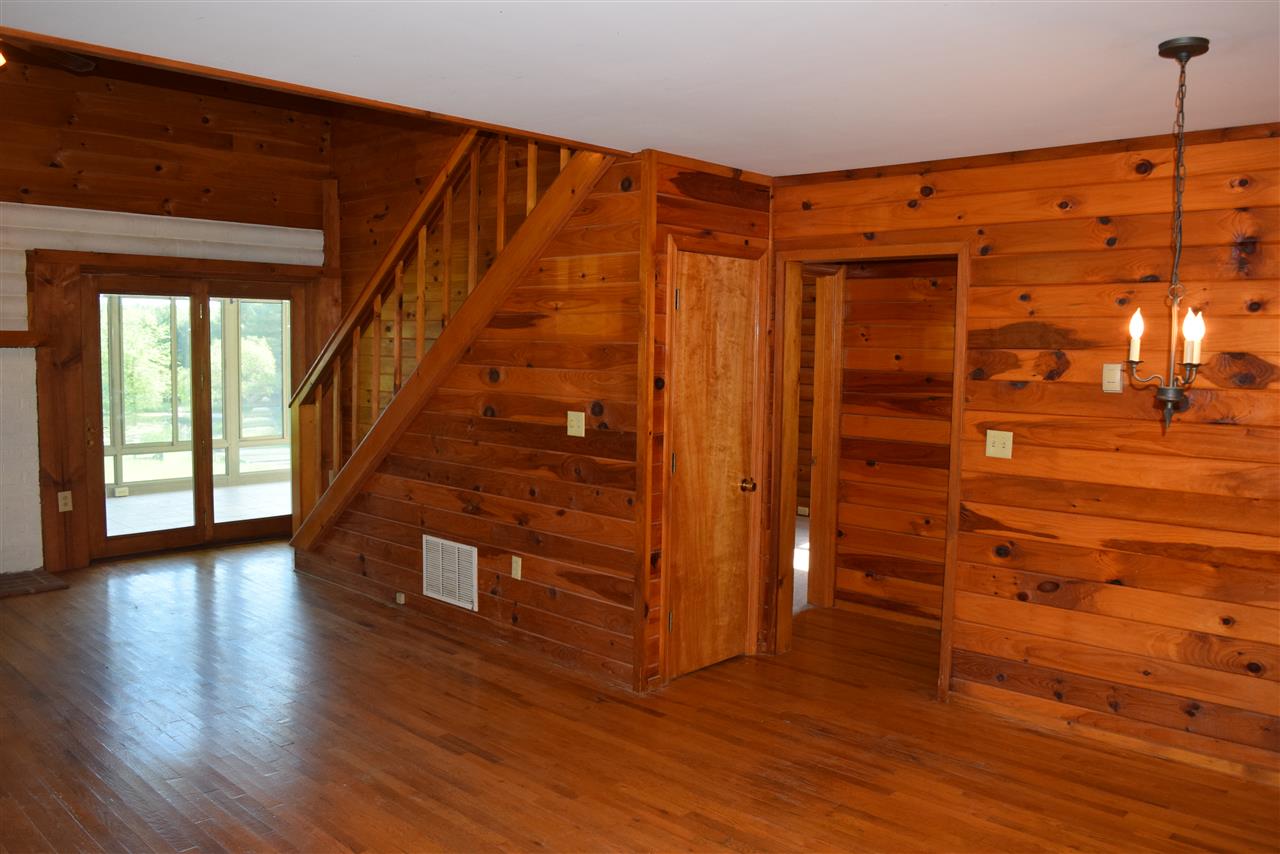382 McKamy Springs Road Middlebrook, VA 24459 - Photo 17 of 48 wooden floor in an empty room with a window