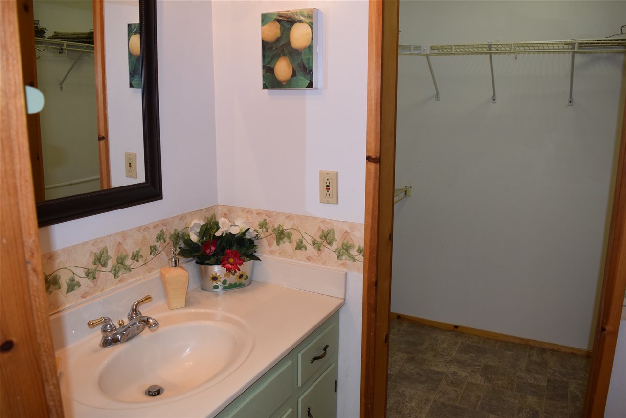 382 McKamy Springs Road Middlebrook, VA 24459 - Photo 28 of 48 a bathroom with a sink and a mirror