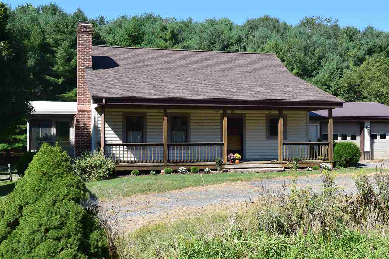 382 McKamy Springs Road Middlebrook, VA 24459 - Photo 3 of 48 a house that has a lot of plants in it