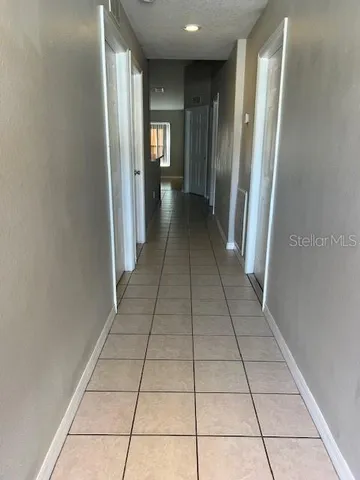 a kitchen with stainless steel appliances kitchen island granite countertop a sink and cabinets