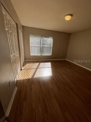 a bathroom with a sink a toilet and a shower