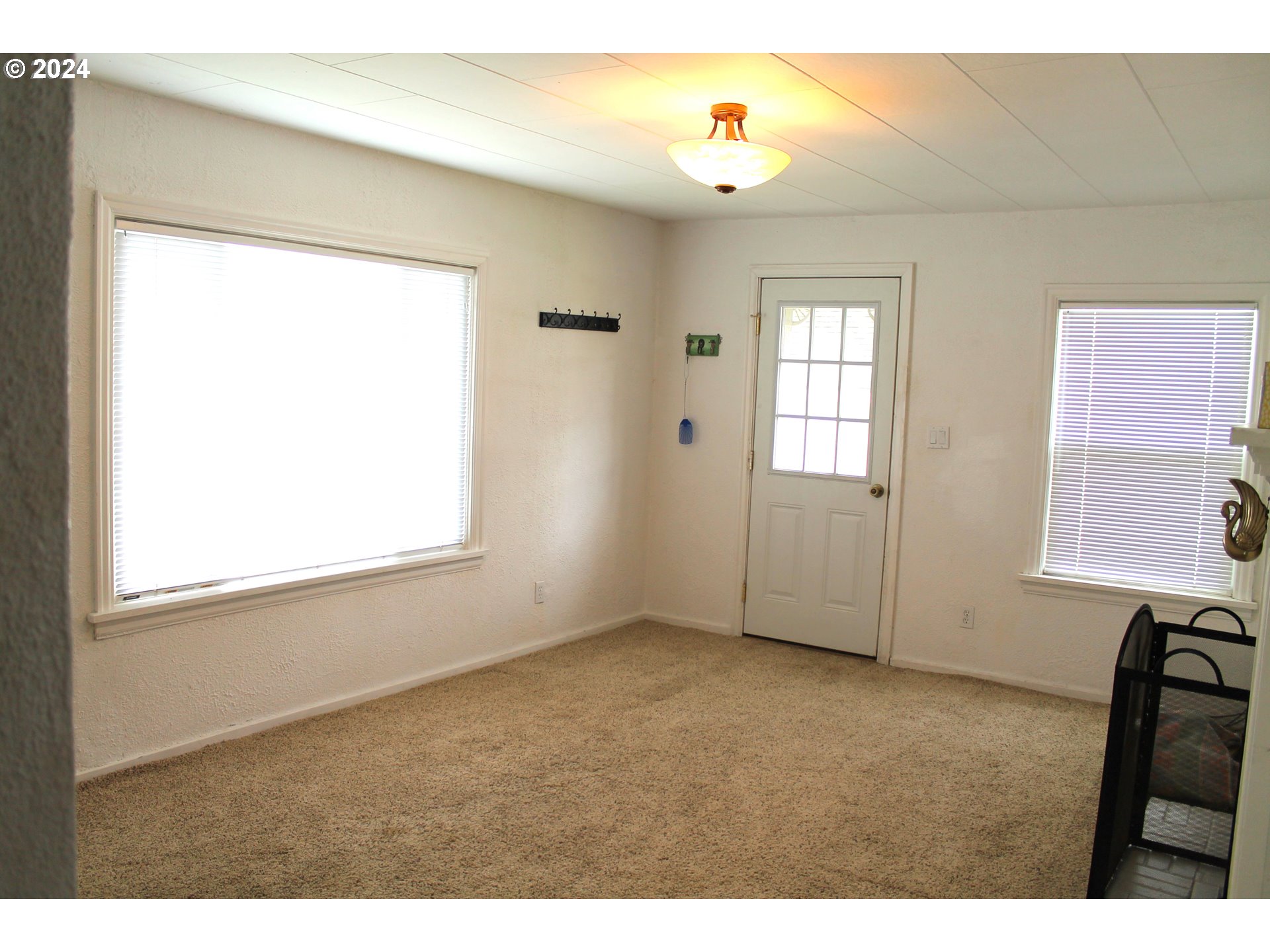 757 South Bridge Street Prairie City, OR 97869 - Photo 11 of 19 a view of an empty room with a window