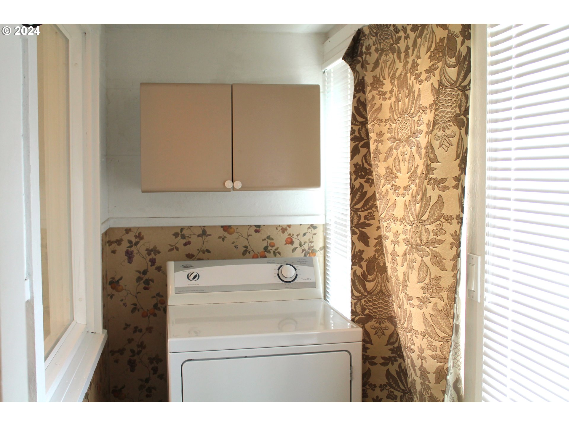 757 South Bridge Street Prairie City, OR 97869 - Photo 15 of 19 a bathroom with a sink and a mirror