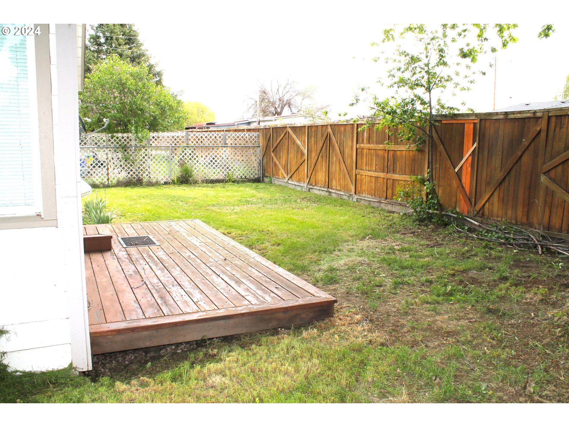 757 South Bridge Street Prairie City, OR 97869 - Photo 7 of 19 a view of backyard with swimming pool and seating