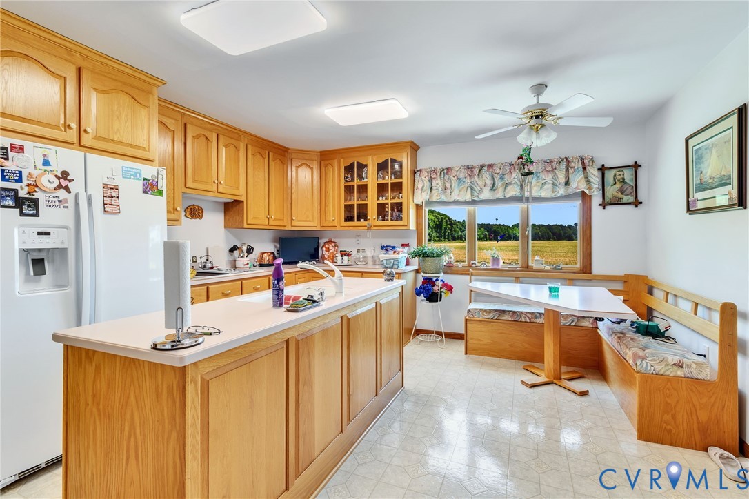 4400 Hacks Neck Road Heathsville, VA 22473 - Photo 34 of 78 a kitchen with stainless steel appliances granite countertop a sink stove and refrigerator
