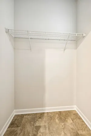 a view of a room with racks on the wall