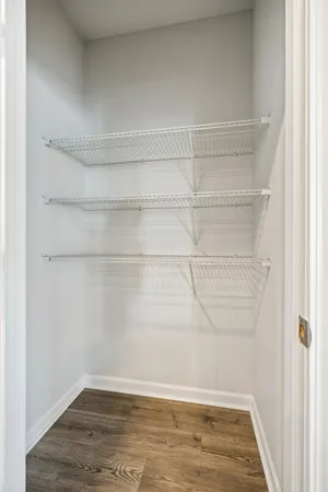 a view of a room with racks on the wall