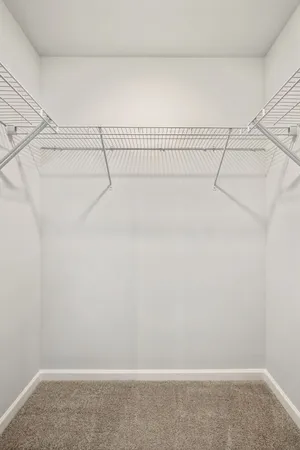 a view of a room with racks on the wall