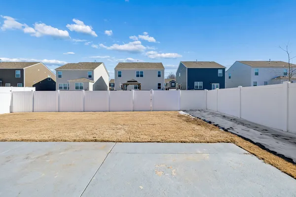a view of a house with a snow in the background