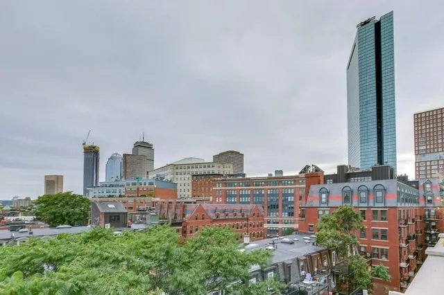 a view of a city with tall buildings