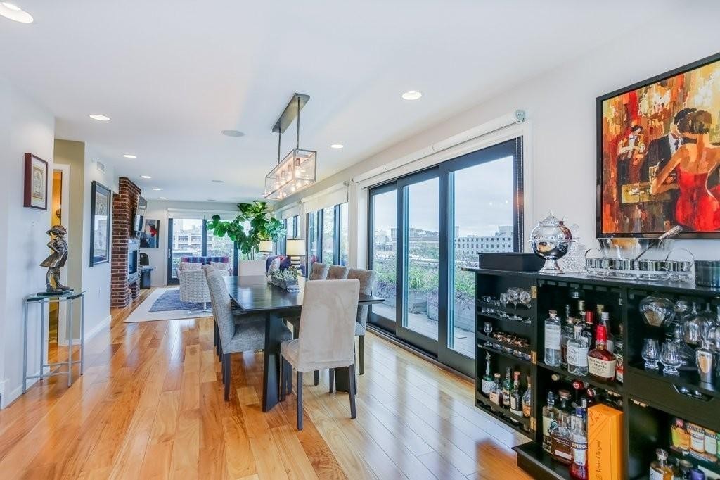 79 Chandler Street, Unit 9 Boston, MA 02116 - Photo 7 of 19 a dining hall with stainless steel appliances granite countertop a stove and refrigerator