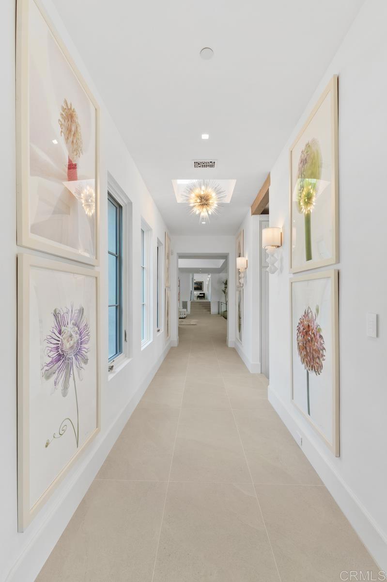 5315 La Crescenta Road Rancho Santa Fe, CA 92067 - Photo 11 of 34 a view of an empty room with painting on the wall