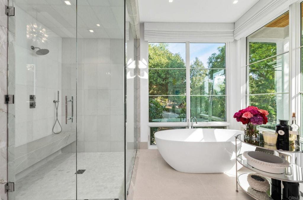 5315 La Crescenta Road Rancho Santa Fe, CA 92067 - Photo 16 of 34 a bathroom with a tub and shower