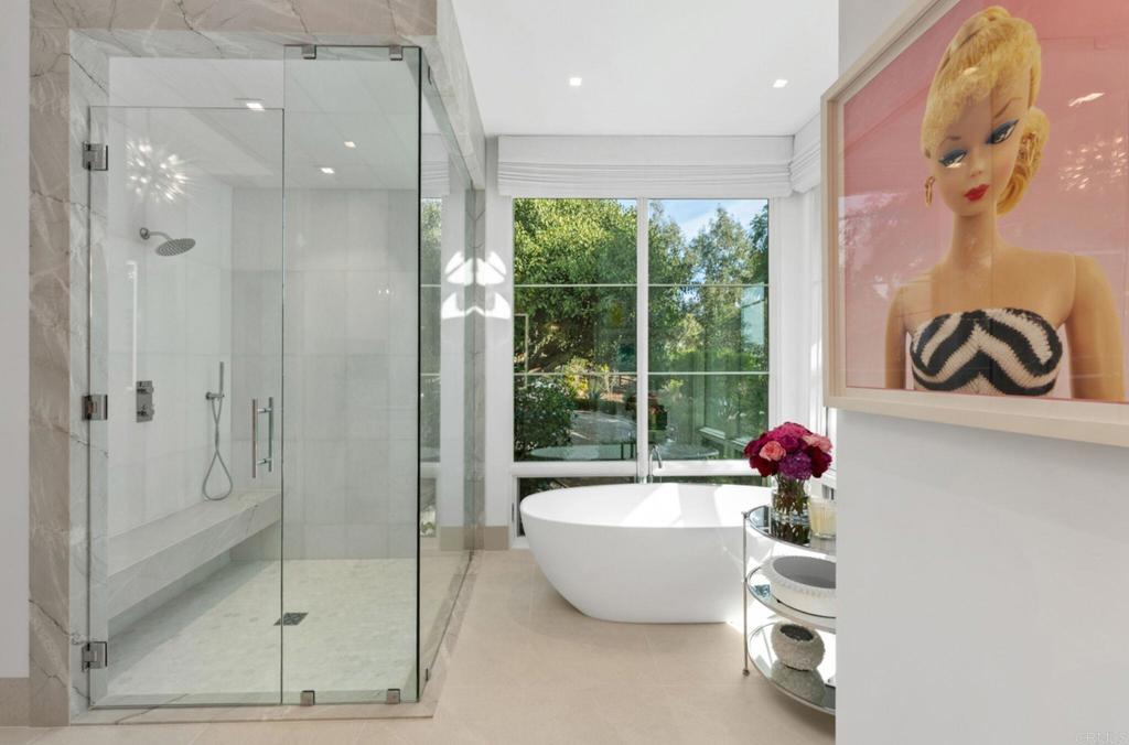 5315 La Crescenta Road Rancho Santa Fe, CA 92067 - Photo 17 of 34 a bathroom with a tub and shower