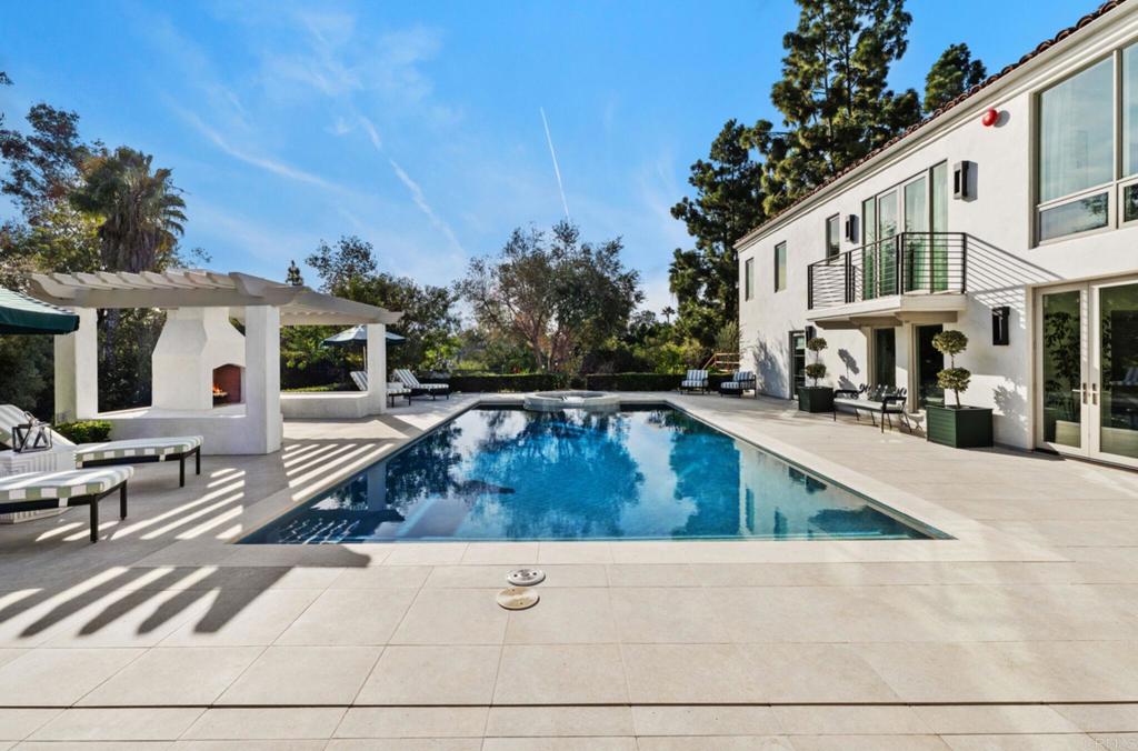 5315 La Crescenta Road Rancho Santa Fe, CA 92067 - Photo 30 of 34 a view of outdoor space with swimming pool and dinning table and chairs