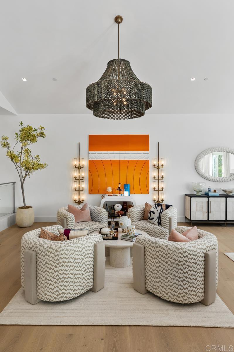 5315 La Crescenta Road Rancho Santa Fe, CA 92067 - Photo 6 of 34 a living room with couches and a potted plant