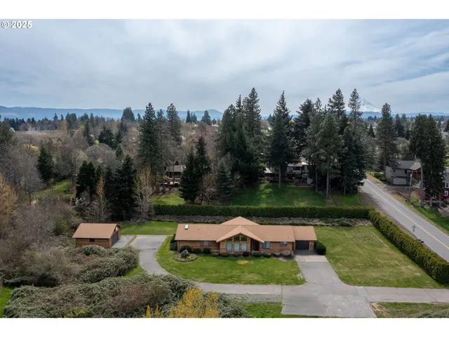 a view of a lake with houses in the back
