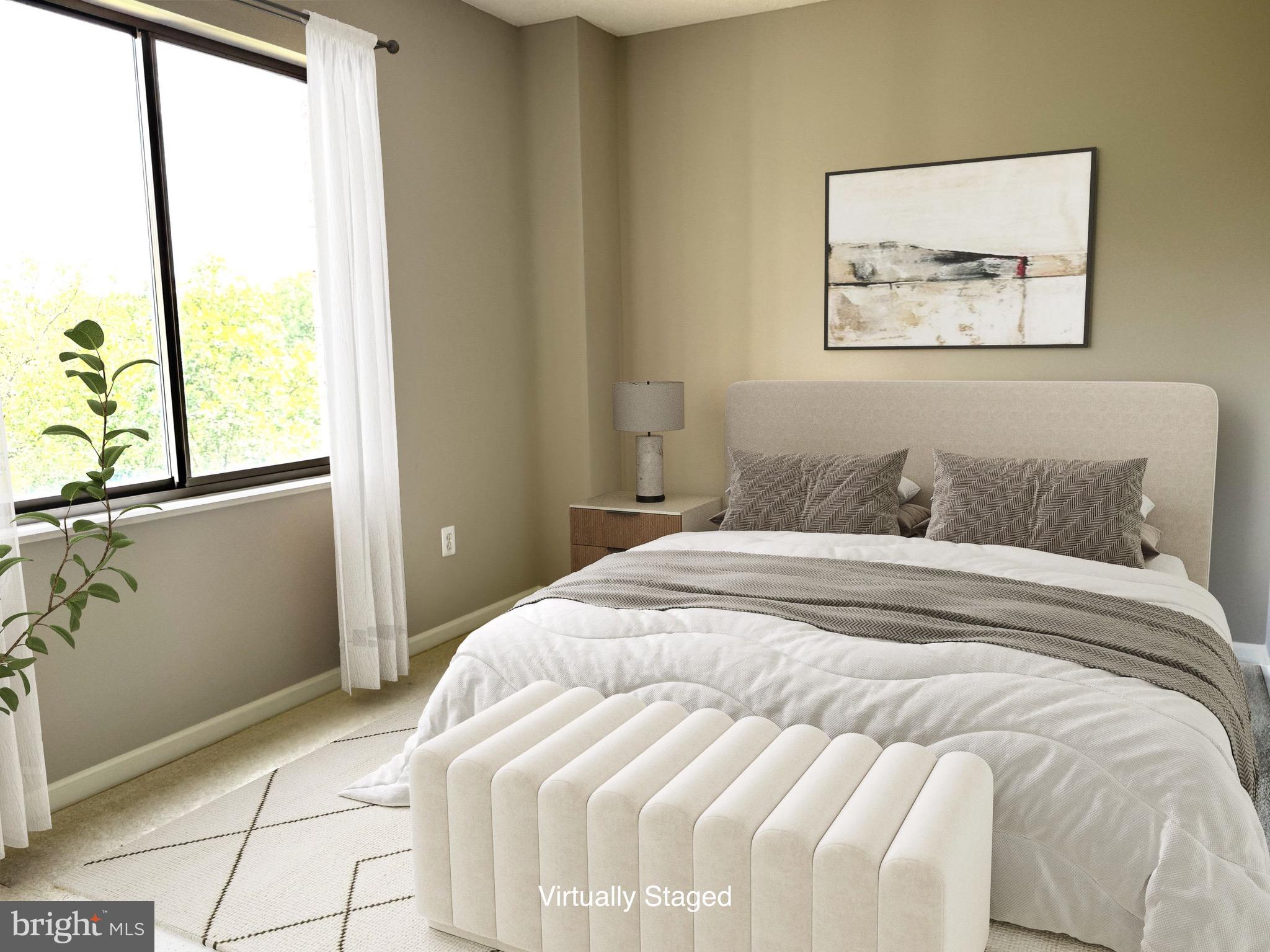 19375 Cypress Ridge Terrace, Unit 404 Leesburg, VA 20176 - Photo 7 of 29 Primary bedroom virtually staged