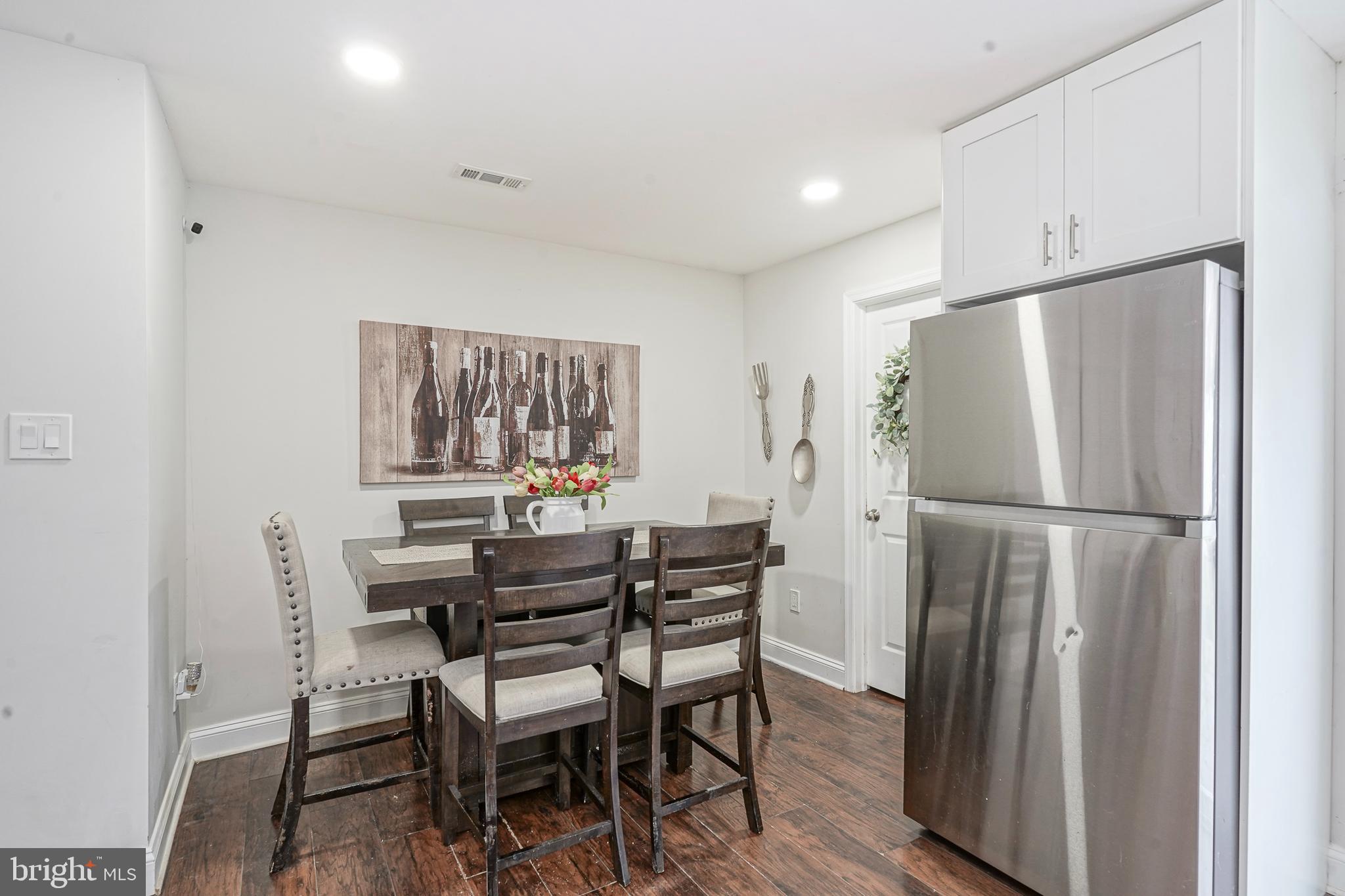 48 Memphis Court Sicklerville, NJ 08081 - Photo 12 of 28 a kitchen with a table and refrigerator