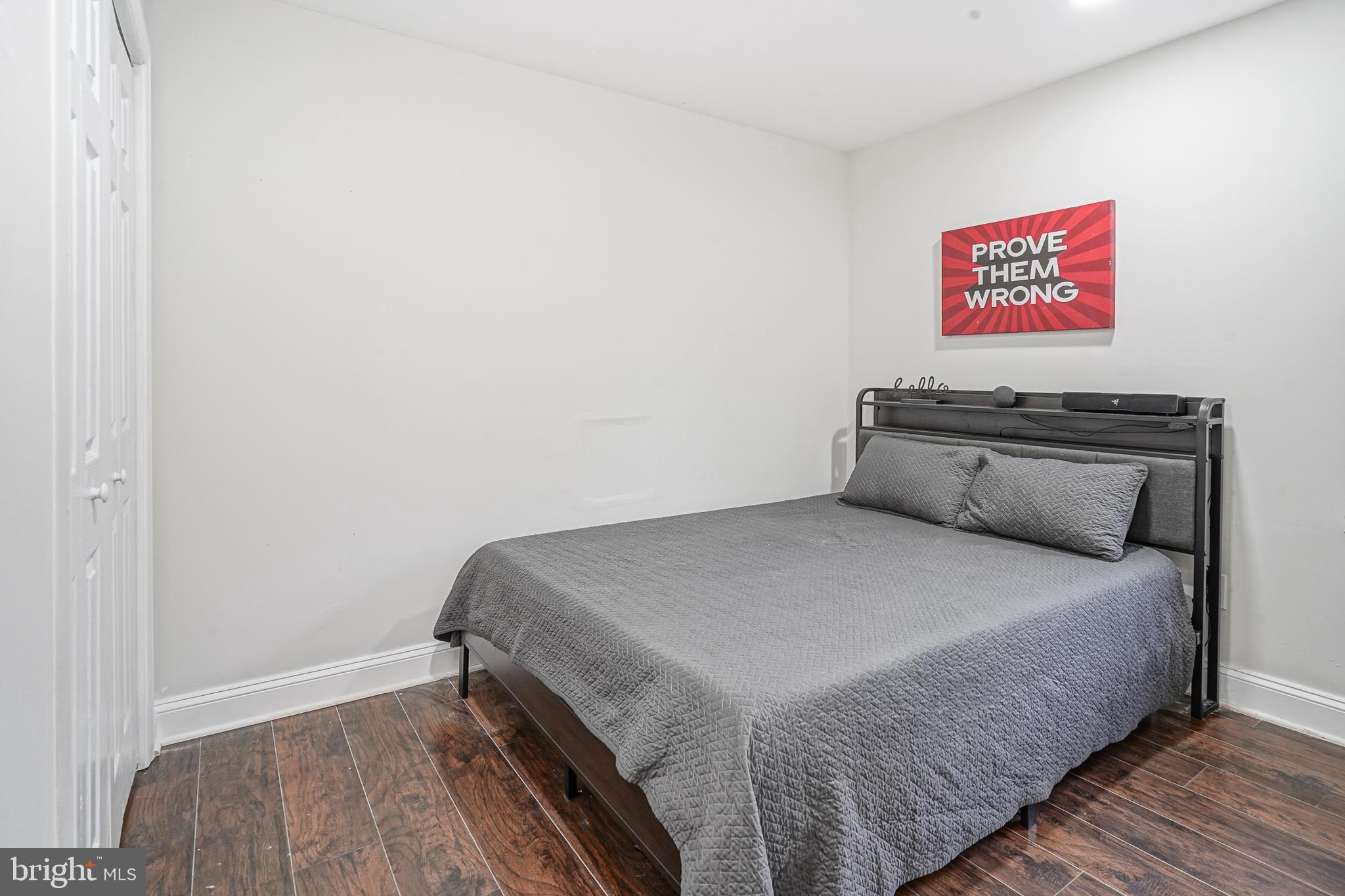 48 Memphis Court Sicklerville, NJ 08081 - Photo 19 of 28 a bedroom with a bed and a table