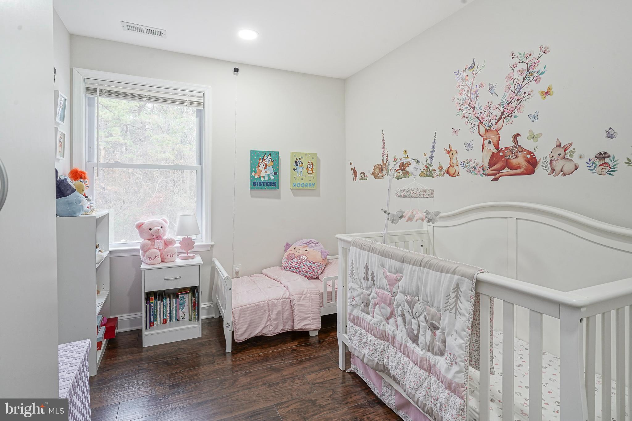 48 Memphis Court Sicklerville, NJ 08081 - Photo 20 of 28 a bedroom with bed and wooden floor