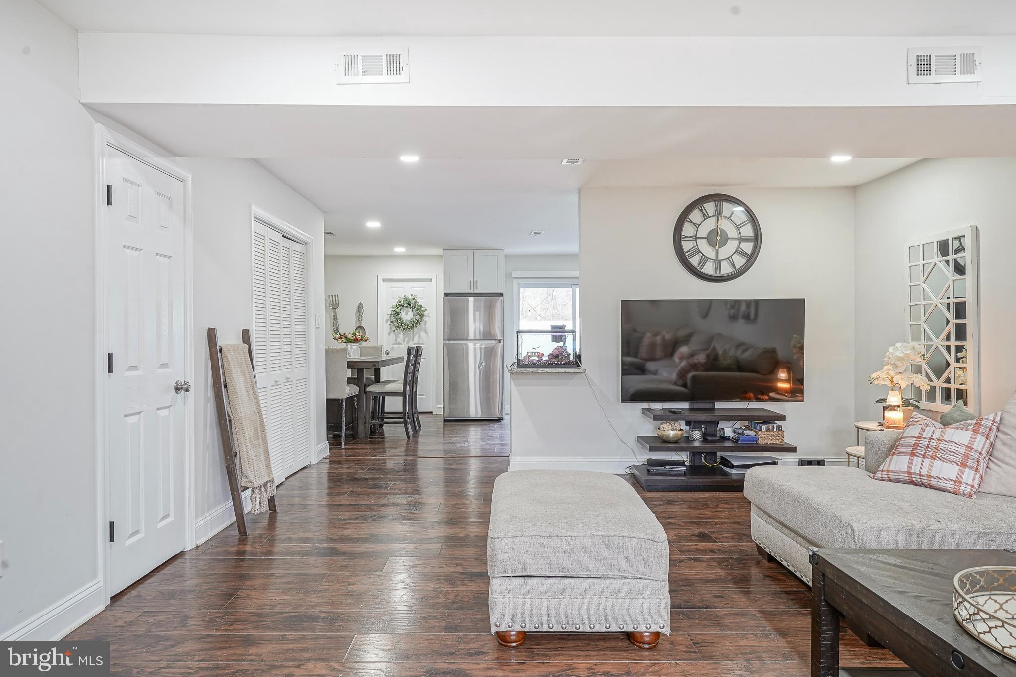48 Memphis Court Sicklerville, NJ 08081 - Photo 6 of 28 a living room with furniture and a flat screen tv