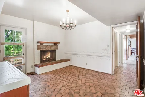 a view of a livingroom with a fireplace