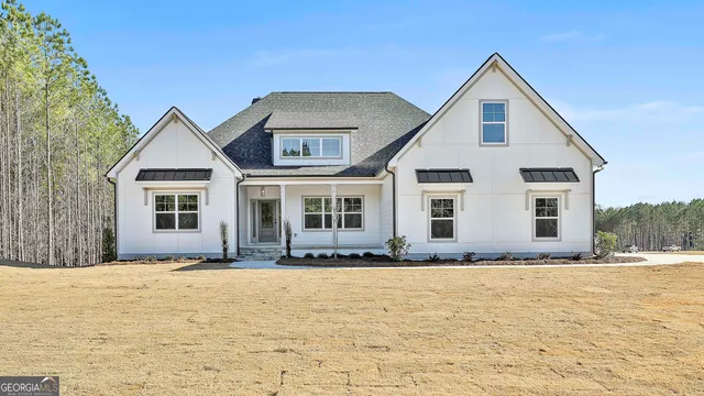 a front view of house with yard