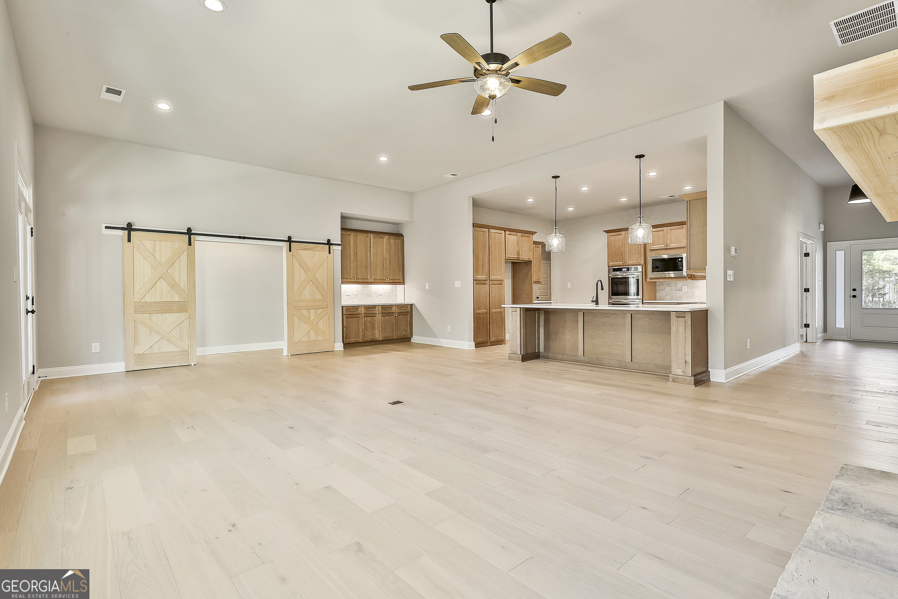 16 Nelson Way, Unit 38 Williamson, GA 30292 - Photo 17 of 44 a view of a kitchen with a sink and a window